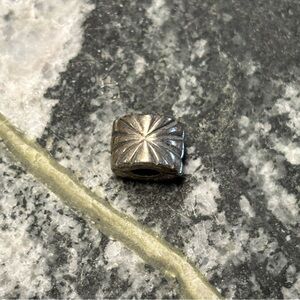 Authentic and Retired Pandora Moments Silver Sunburst Clip Charm 925